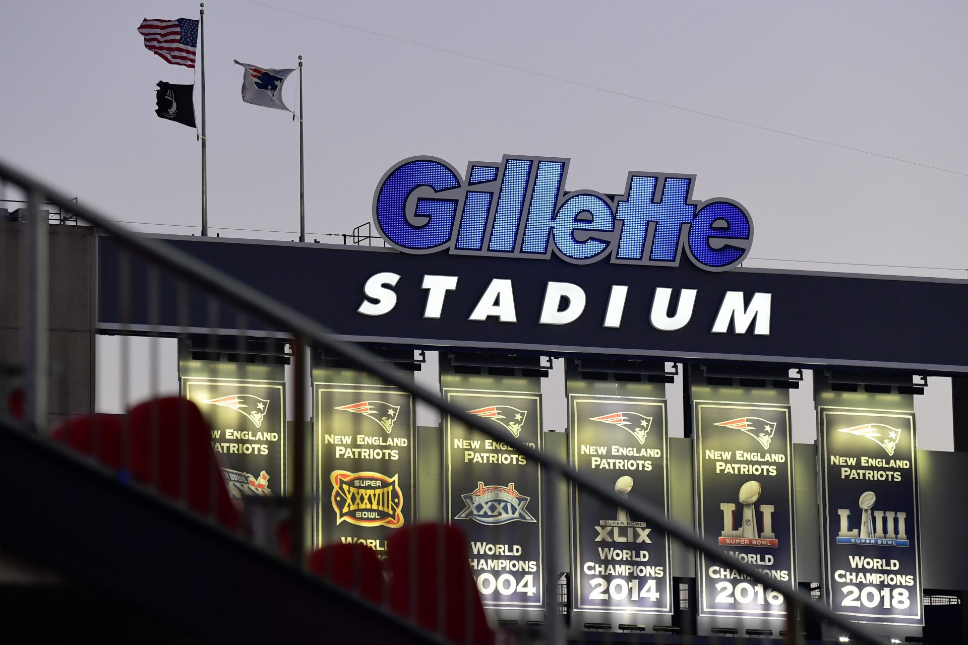 Two men charged over death of Patriots fan