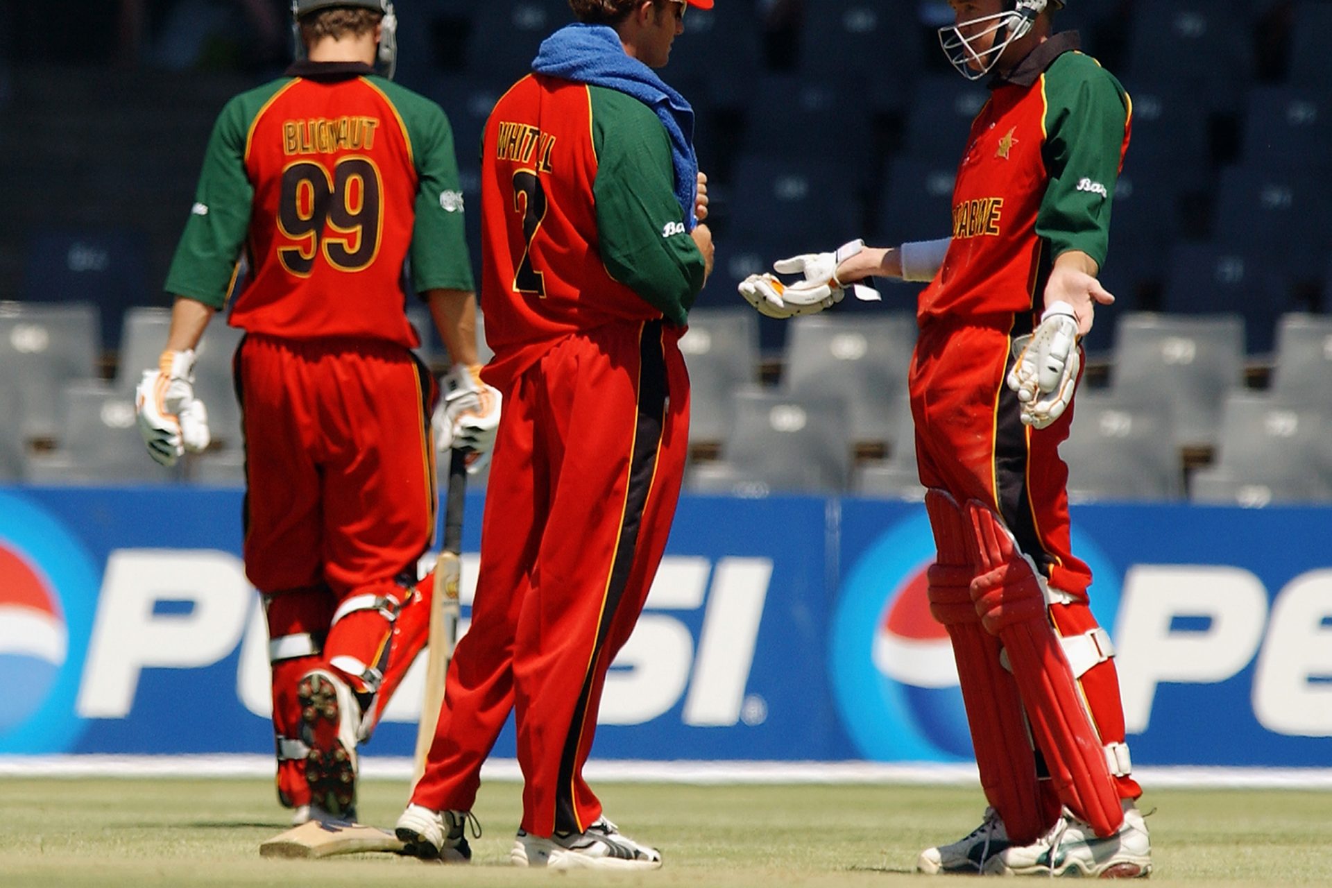 6: Henry Olonga and Andy Flower mourn