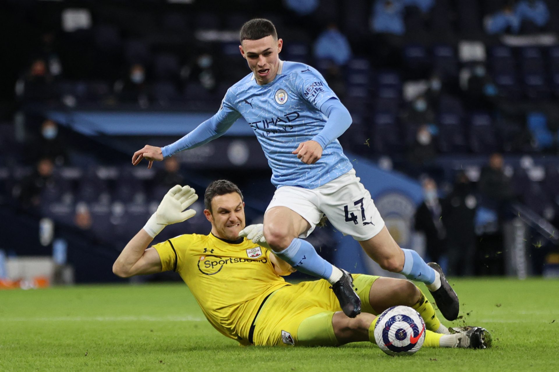 9. Alex McCarthy takes out Phil Foden in the box - Manchester City vs Southampton 2021