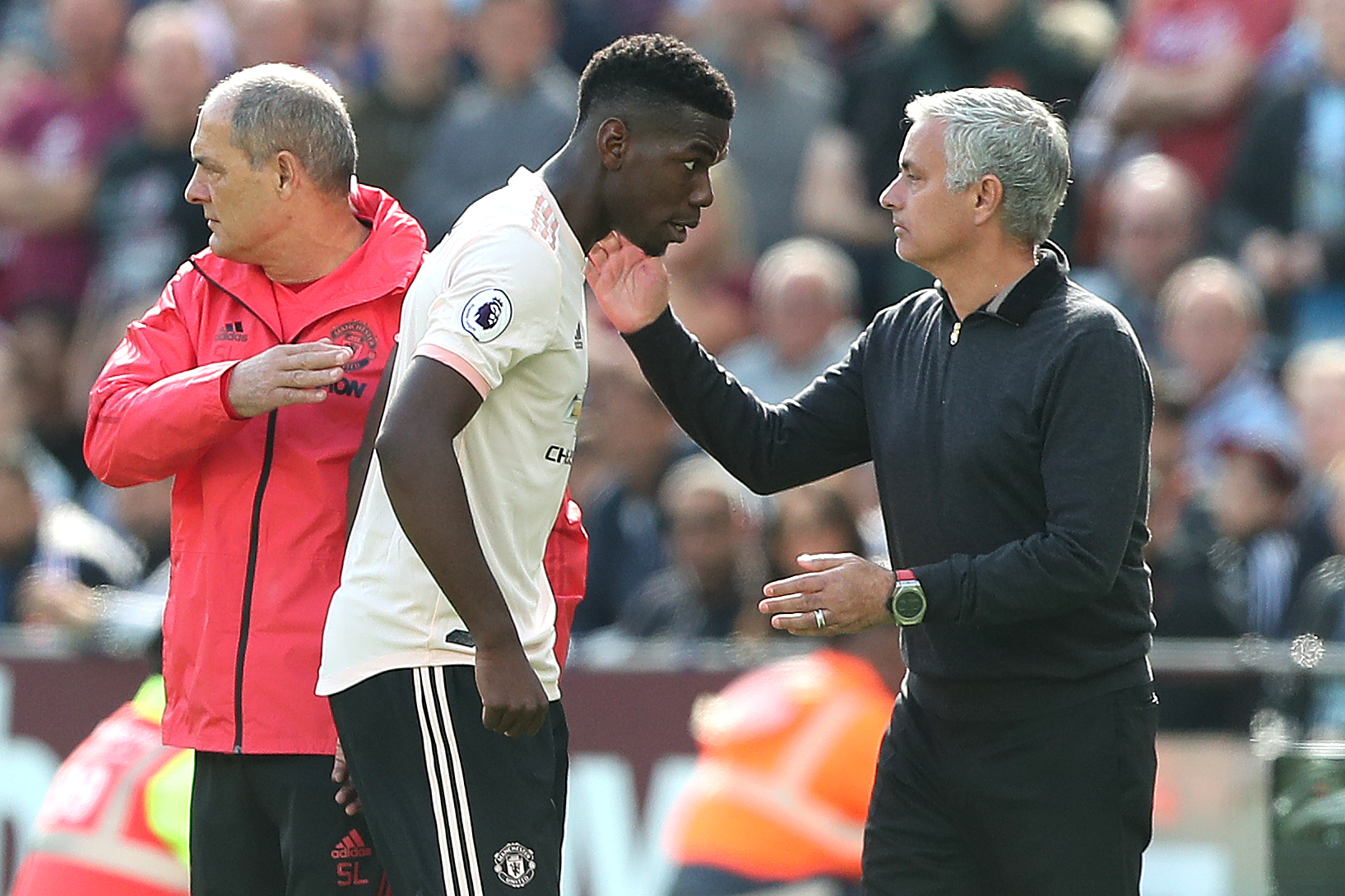 Paul Pogba and Jose Mourinho 