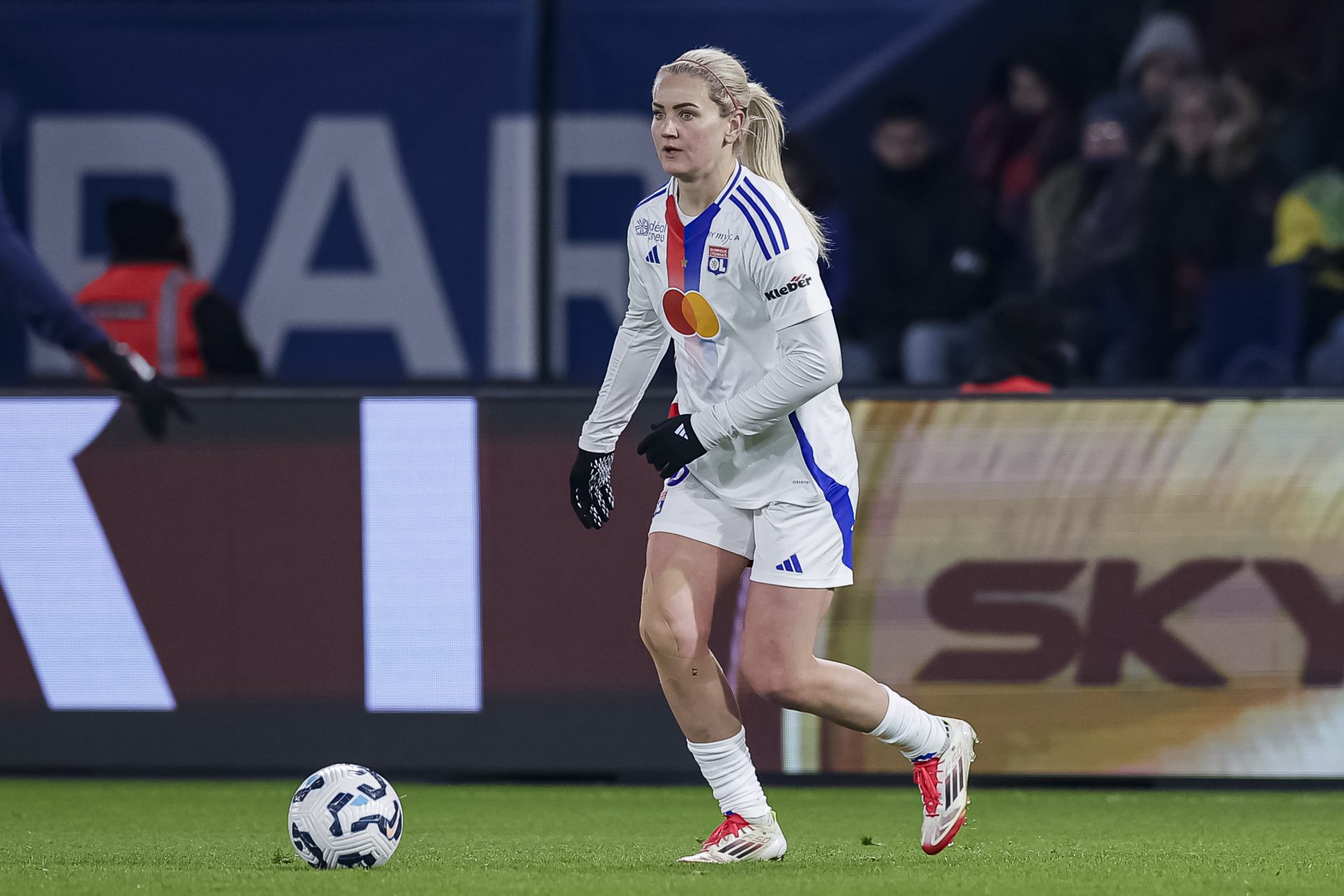 Playing for Olympique Lyonnais Féminin